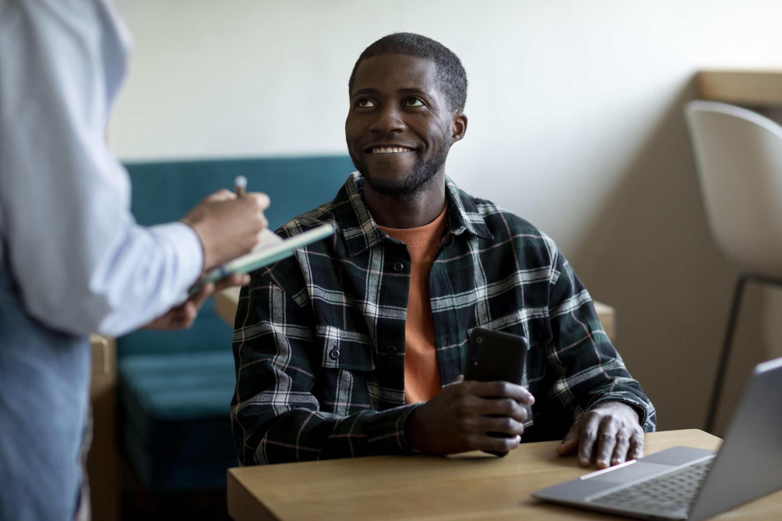 close-up-man-sitting-table